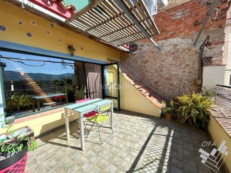 Foto c6ba1bc6-e50e-4720-a4fb-e87cf248e077. Casa aparellada a Ulldecona