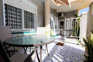 Appartement à Rojales. Planta baja adosada de tres dormitorios con amplia terraza en el