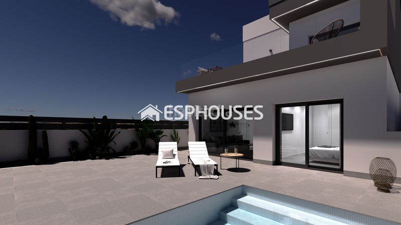 Foto 3ea1bdde-547c-4850-94d4-79a915fd26bc. Chalet villa de obra nueva con piscina privada, solárium y sótano en Benijófar