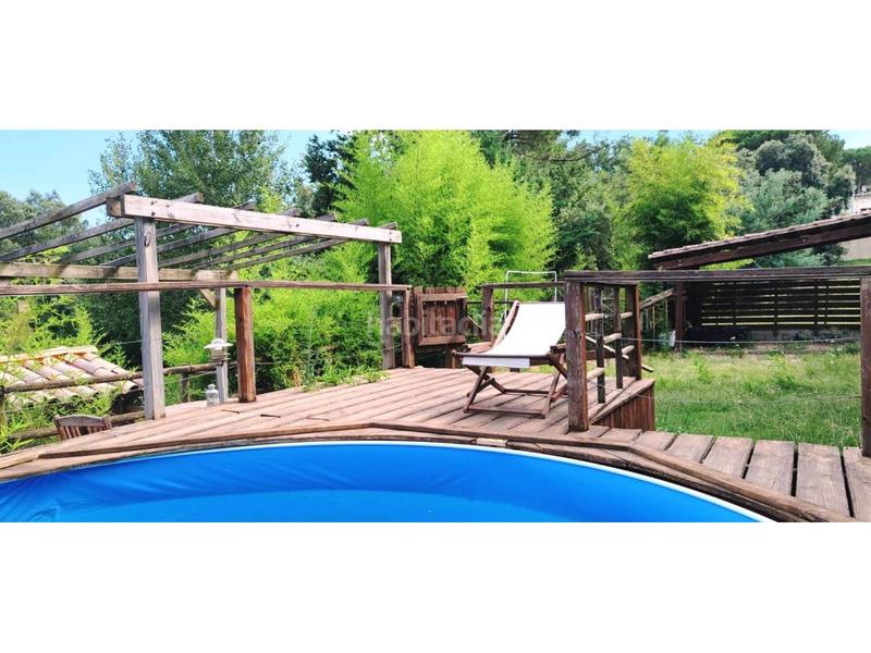 Foto 5dd04f95-1147-4f0b-9c29-2368c1842a21. Casa con riscaldamento parcheggio piscina in Santa Coloma de Farners