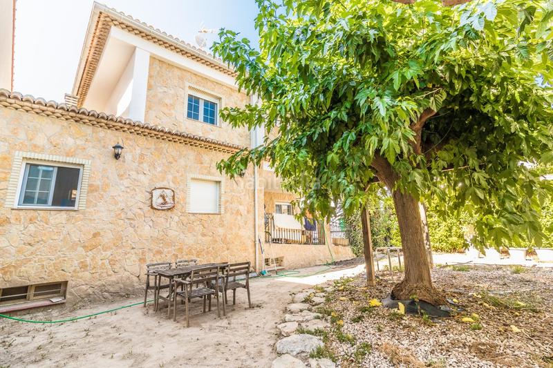 Foto 24c51877-f357-4fe9-8763-83b87cb688ea. Reihenhaus mit parking in Senyera