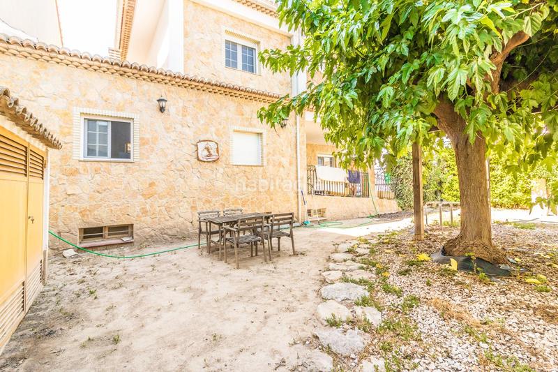 Foto ee6b9dd8-508e-4121-b4f6-92c2d3469ae0. Reihenhaus mit parking in Senyera