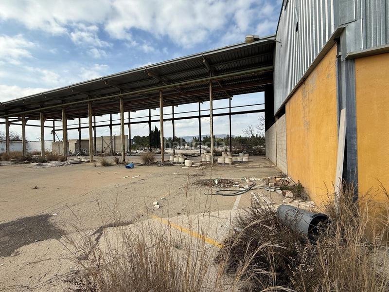 Foto d3f9588d-6023-4959-bc3f-fe1040c94ceb. Terreno residencial suelo rústico con dos naves y una vivienda en Canals