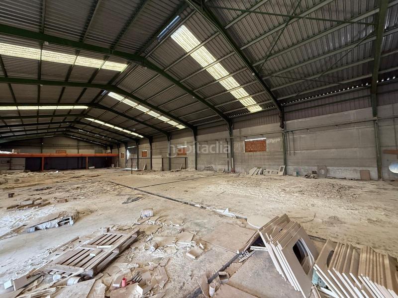 Foto e392611a-18ae-4f4c-a137-421210fcde1f. Terreno residencial suelo rústico con dos naves y una vivienda en Canals