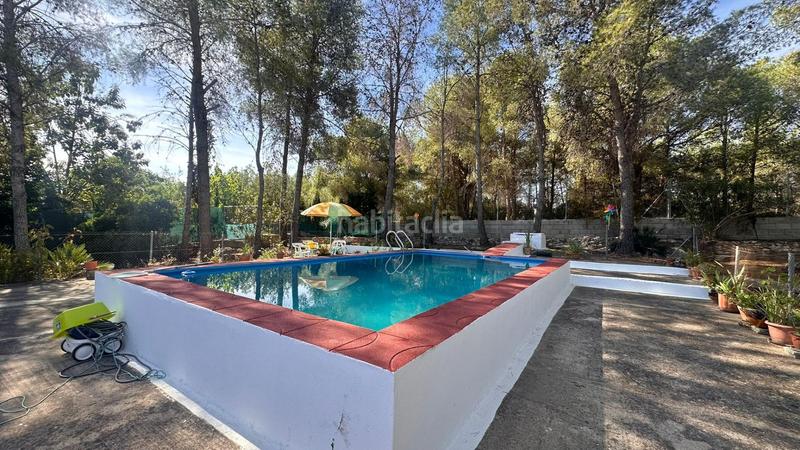 Foto 024c1a8f-1bee-41f9-84c7-595f4192f64f. Xalet amb aparcament a Carlet