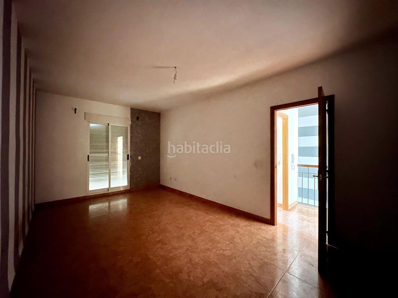 Foto 9cca9238-a58a-4a3b-87fd-2e588ba1db8f. Casa adossada amb aparcament a Carlet