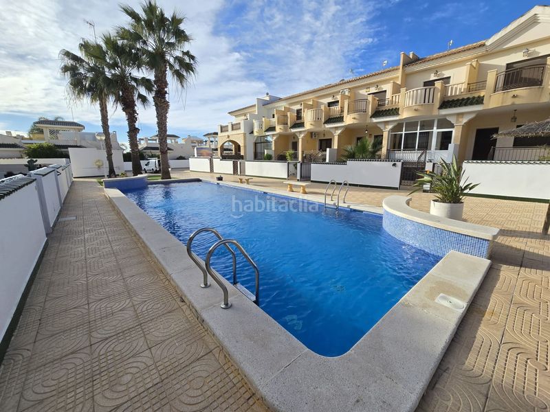 Foto b4814e55-e8e5-4ba9-9183-79cbab6c3e4f. Casa adossada amb piscina a Lo Marabú Rojales