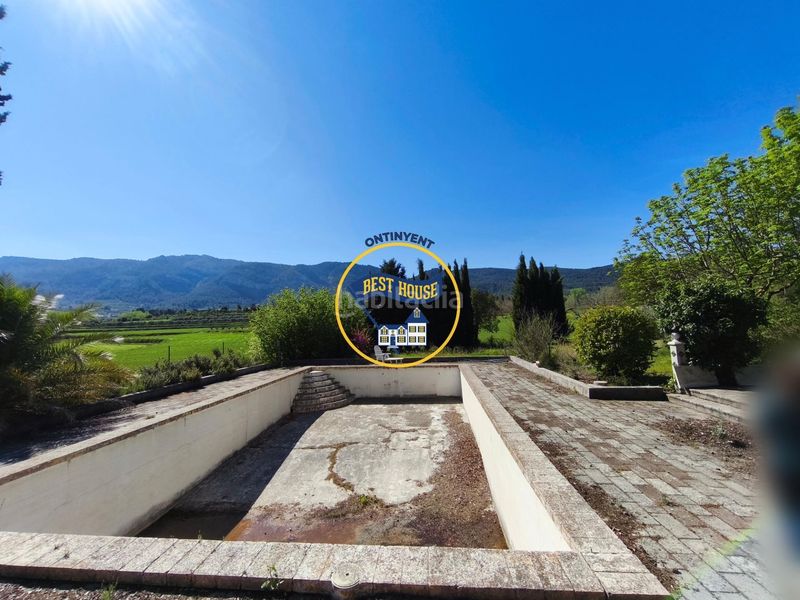 Foto be3df264-2910-461e-b620-ca2aa468465d. Masia amb piscina a Alfafara