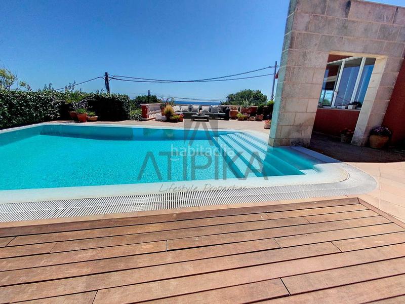 Foto a5ba2c63-e356-4e6d-b850-dc8f4ec63146. Casa amb aparcament piscina a Biniancolla-Punta Prima Sant Lluís