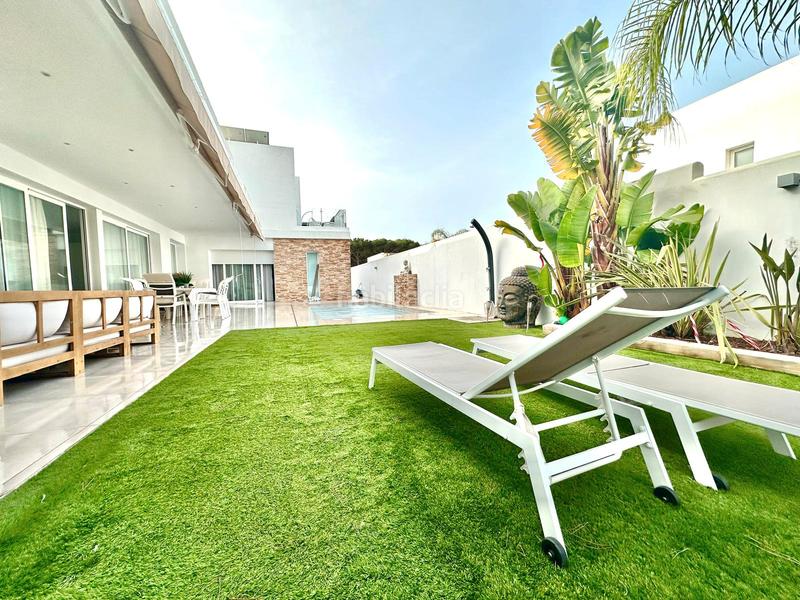 Foto 718ddd40-7b48-4a45-8447-af99a47a14c9. Chalet avec cheminée chauffage parking piscine dans Chiclana de la Frontera