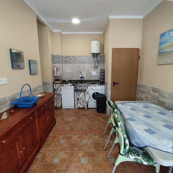 Foto 9b60596a-3c48-4c49-a9ac-9963cad21330. Casa adossada a Les Palmeres Sueca
