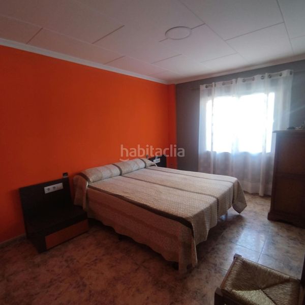 Foto 5c6b0397-e198-4073-affb-8c5144ead730. Casa amb aparcament a Les Palmeres Sueca