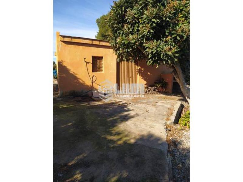 Foto 48f642be-170e-47af-88f0-3bfb8234d7e1. Masía ref 28207terreno con casa diafano en venta o, de 70 m, piscina, jardín, de 15400 m, zona monte, casa de aperos de 70m2 en Sagunt
