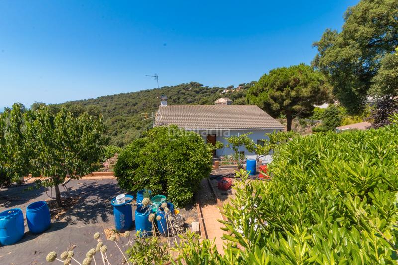 Foto bf7e2386-6a06-4421-84a7-c58817049b1f. Xalet amb xemeneia aparcament piscina a Sant Cebrià de Vallalta