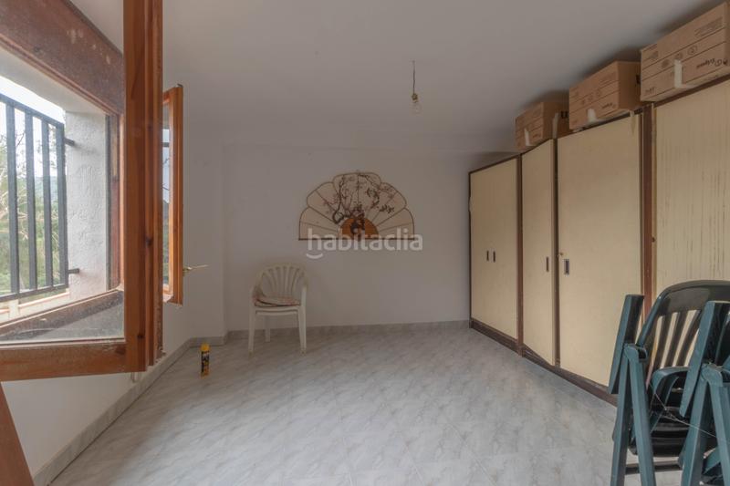 Foto 3a2a3377-a40b-42c1-8b30-a9ba75282e44. Maison jumelée avec cheminée dans Sant Cebrià de Vallalta