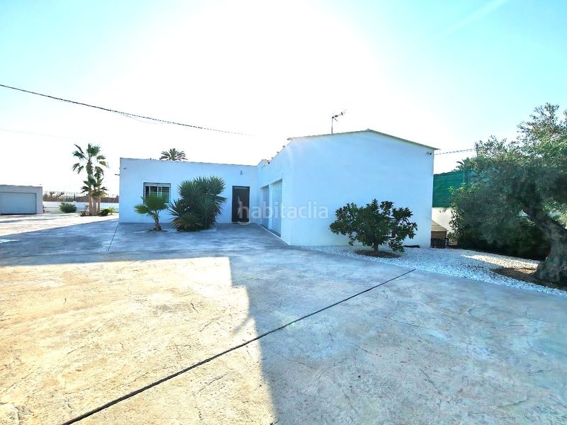 Foto 7707d51e-d6bb-4c48-8c72-59e3db05be2d. Casa amb xemeneia calefacció aparcament piscina a Elche / Elx