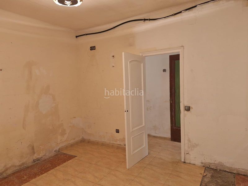Foto 5fbb834a-51e0-45e0-a34f-8d9671b0fe9a. Casa adossada a Poble Nou Terrassa