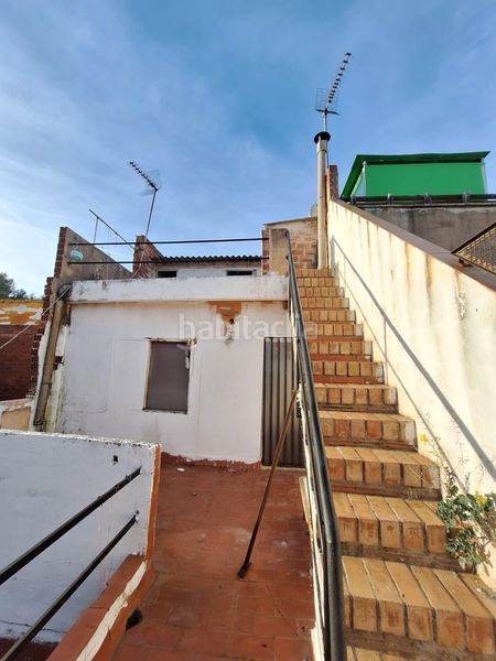 Foto ec6c4020-14b7-43c7-a1dd-645a9ddfb8bd. Casa adossada a Poble Nou Terrassa
