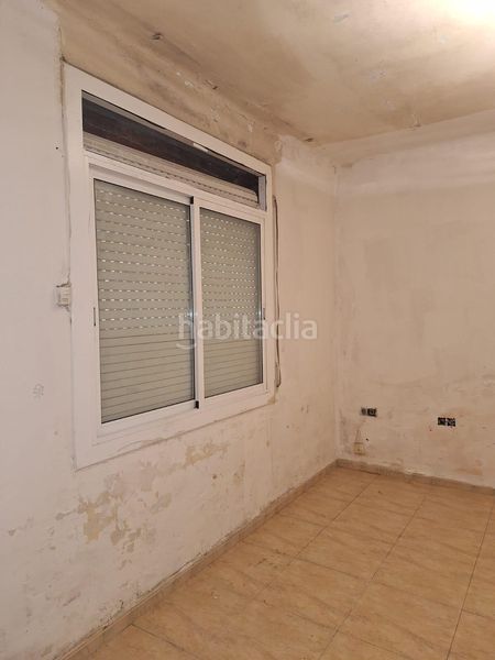 Foto 09a590ae-5333-40a1-9379-249b4c7eee67. Casa adossada a Poble Nou Terrassa